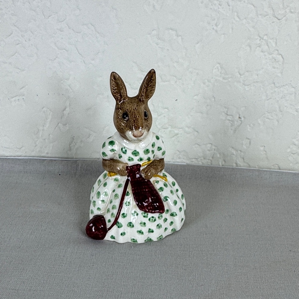 Brown Bunny Figurine in White Dress with Green Polka Dots and Maroon Accessory‎